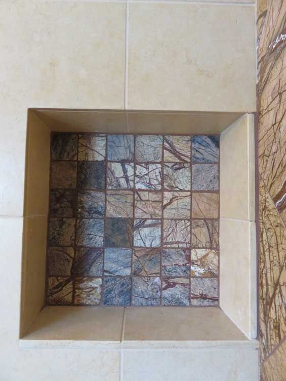 Walk-in shower with porcelain tile by Miconi Marble & Tile