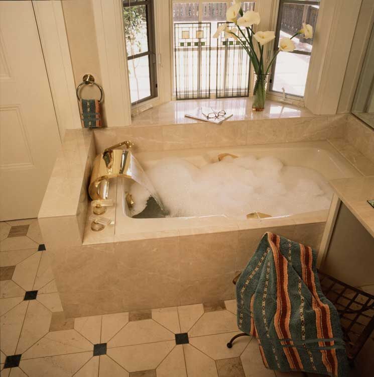 Marble shower surround in a Marin County master bath by Miconi