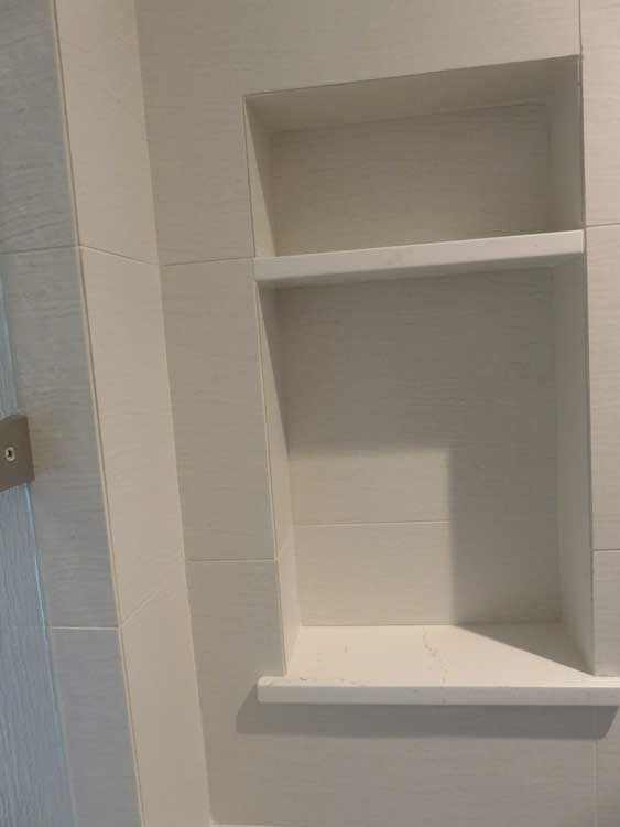 Marin County bathroom by Miconi Marble & Tile — marble shower surround (project 31)