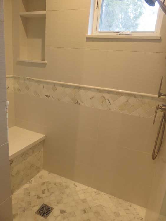 Marin County bathroom by Miconi Marble & Tile — walk-in shower with tile bench (project 36)