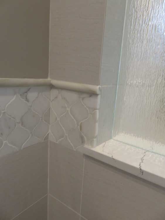 Marin County bathroom by Miconi Marble & Tile — marble shower surround (project 41)