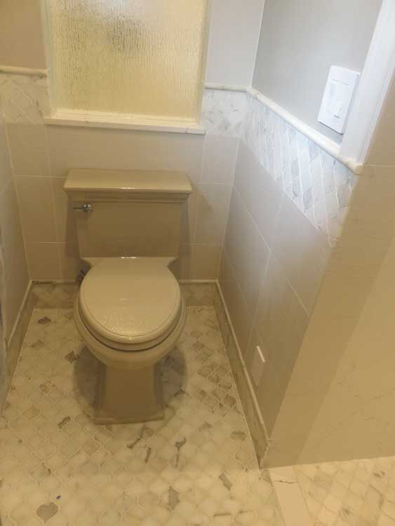 Marin County bathroom by Miconi Marble & Tile — natural stone tile floor (project 42)